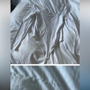 Elegant White Long Sleeve Bodysuit